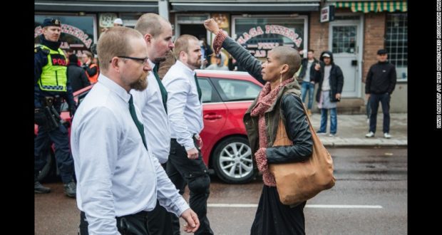 Lone woman confronts neo-Nazi march in sweden