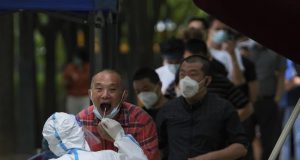 China reduces quarantine for people arriving from abroad.